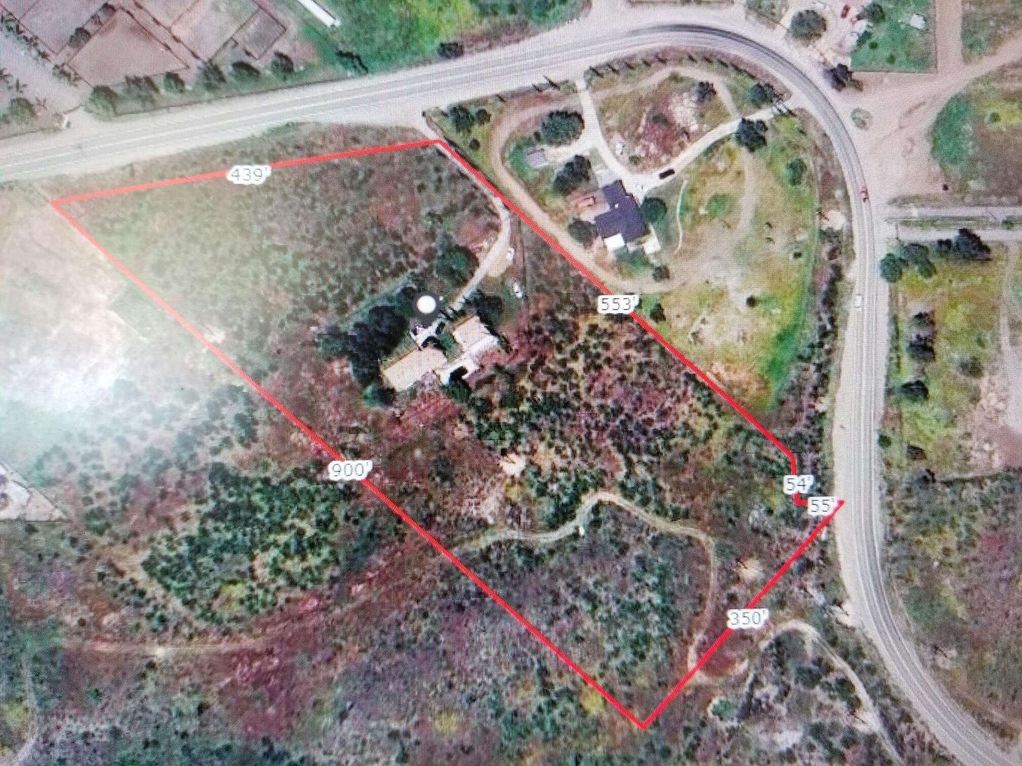 19145 Santa Rosa Mine Road Perris, CA 92570 - Photo 2 of 16 a view of a wooden door with a tree