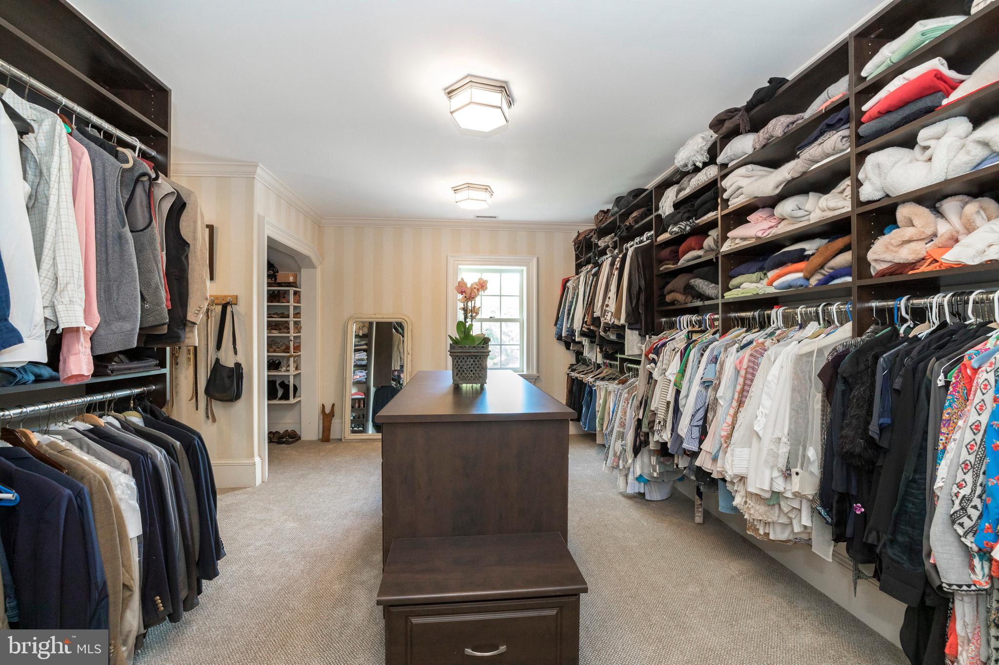 380 Upland Road Kennett Square, PA 19348 - Photo 44 of 106 a view of walk in closet with clothes and shoes