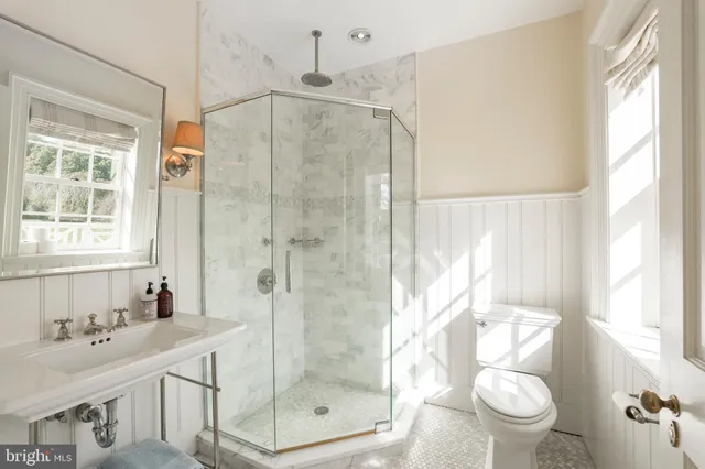a view of a patio with a table chairs and backyard