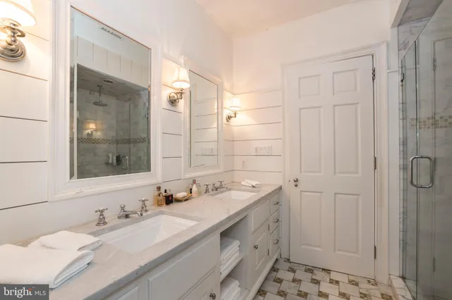 a view of a garden with large trees