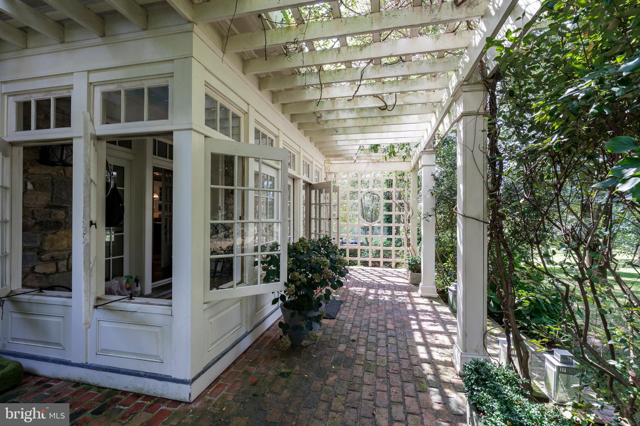 380 Upland Road Kennett Square, PA 19348 - Photo 84 of 106 a view of a porch with a bench