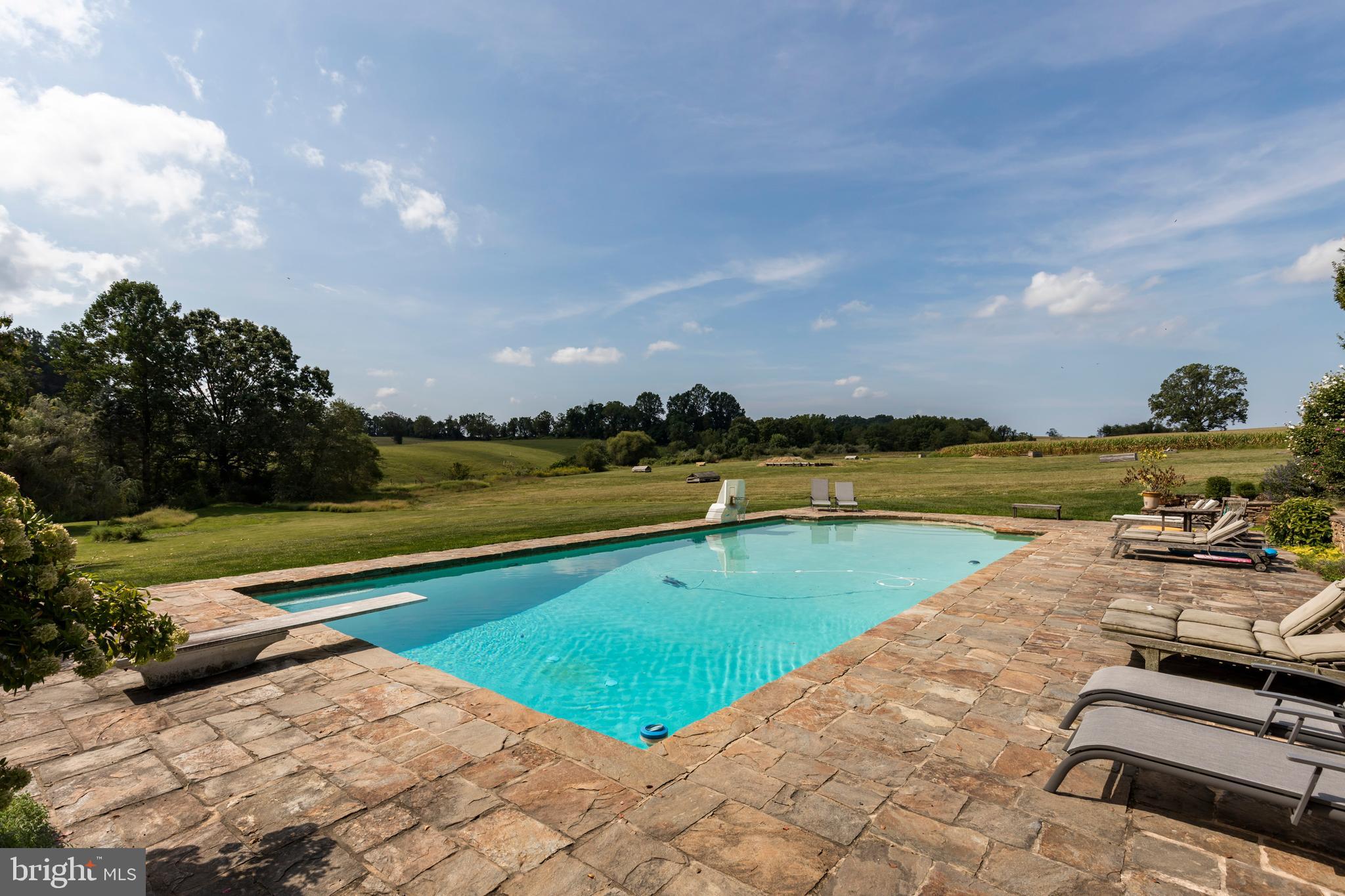 380 Upland Road Kennett Square, PA 19348 - Photo 97 of 106 a view of a lake with houses in the back