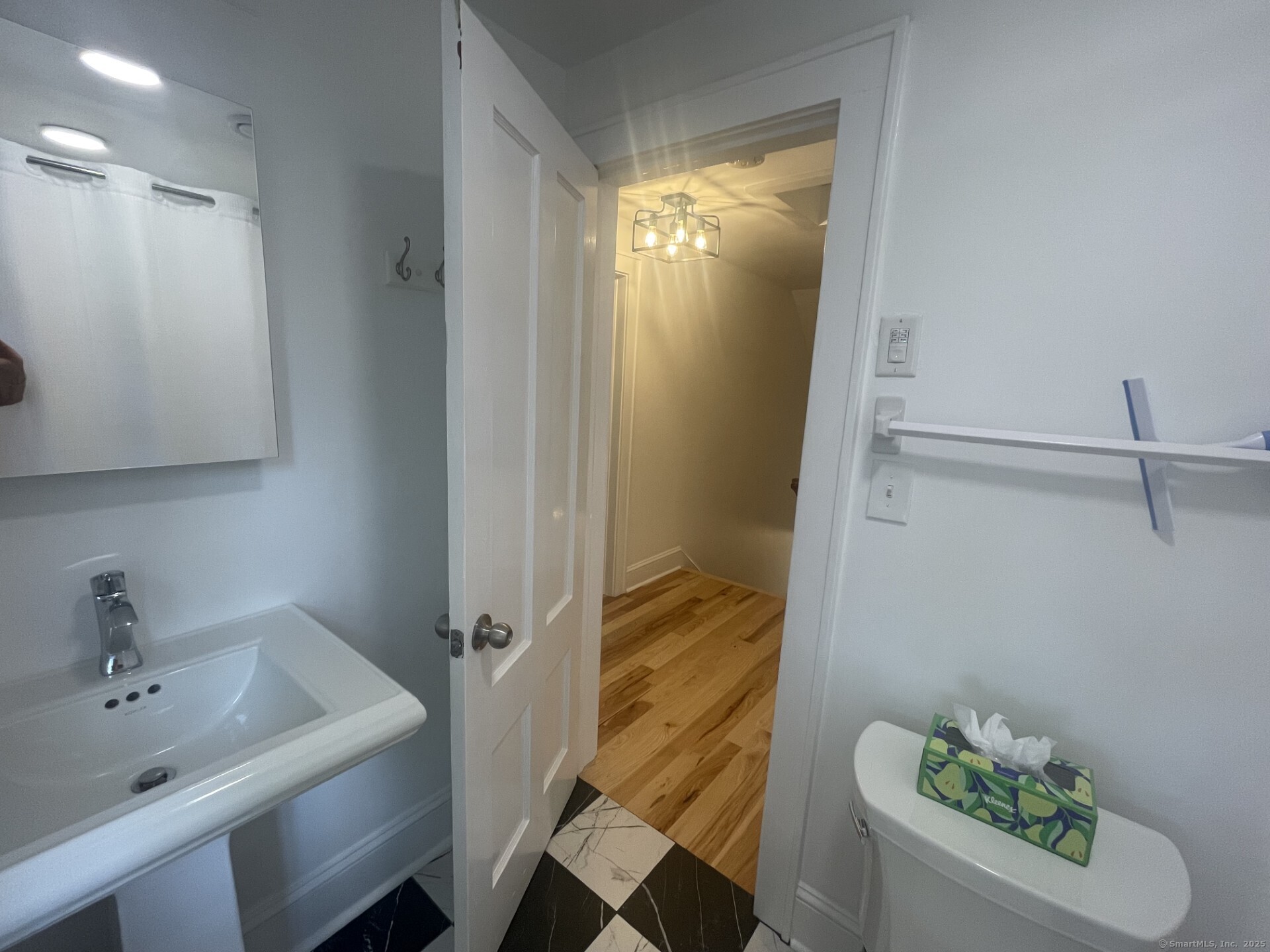 99 Bay View Avenue Groton, CT 06355 - Photo 28 of 34 a bathroom with a sink a toilet and shower