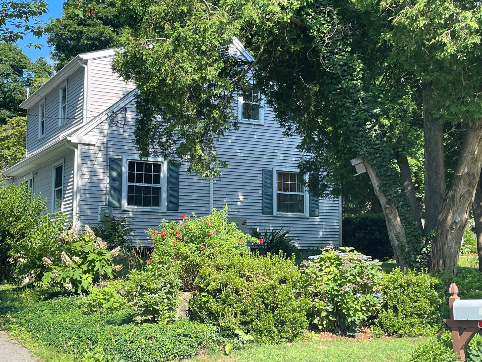 99 Bay View Avenue Groton, CT 06355 - Photo 4 of 70 front view of a house with a yard