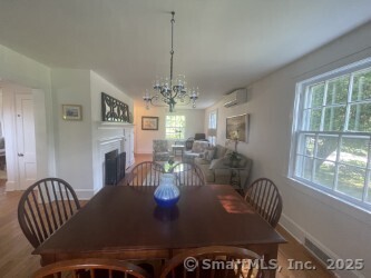 99 Bay View Avenue Groton, CT 06355 - Photo 42 of 70 a view of a dining room with furniture window and outside view
