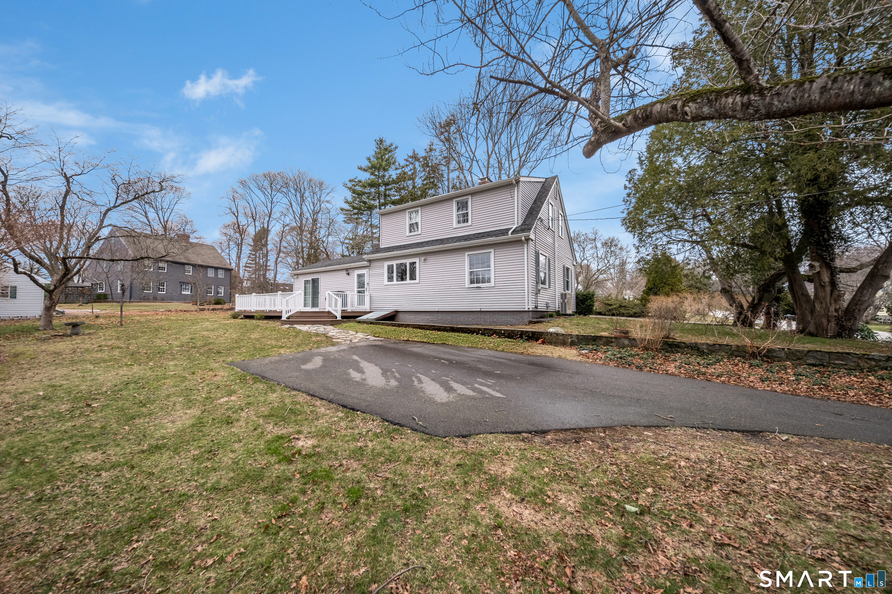 99 Bay View Avenue Groton, CT 06355 - Photo 62 of 70 a view of a house with a yard with large tree