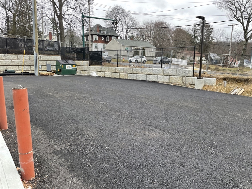1 Brattle Street, Unit 1 Worcester, MA 01606 - Photo 21 of 21 a view of yard with a car parked on the road