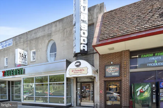 a book store on the corner of the street