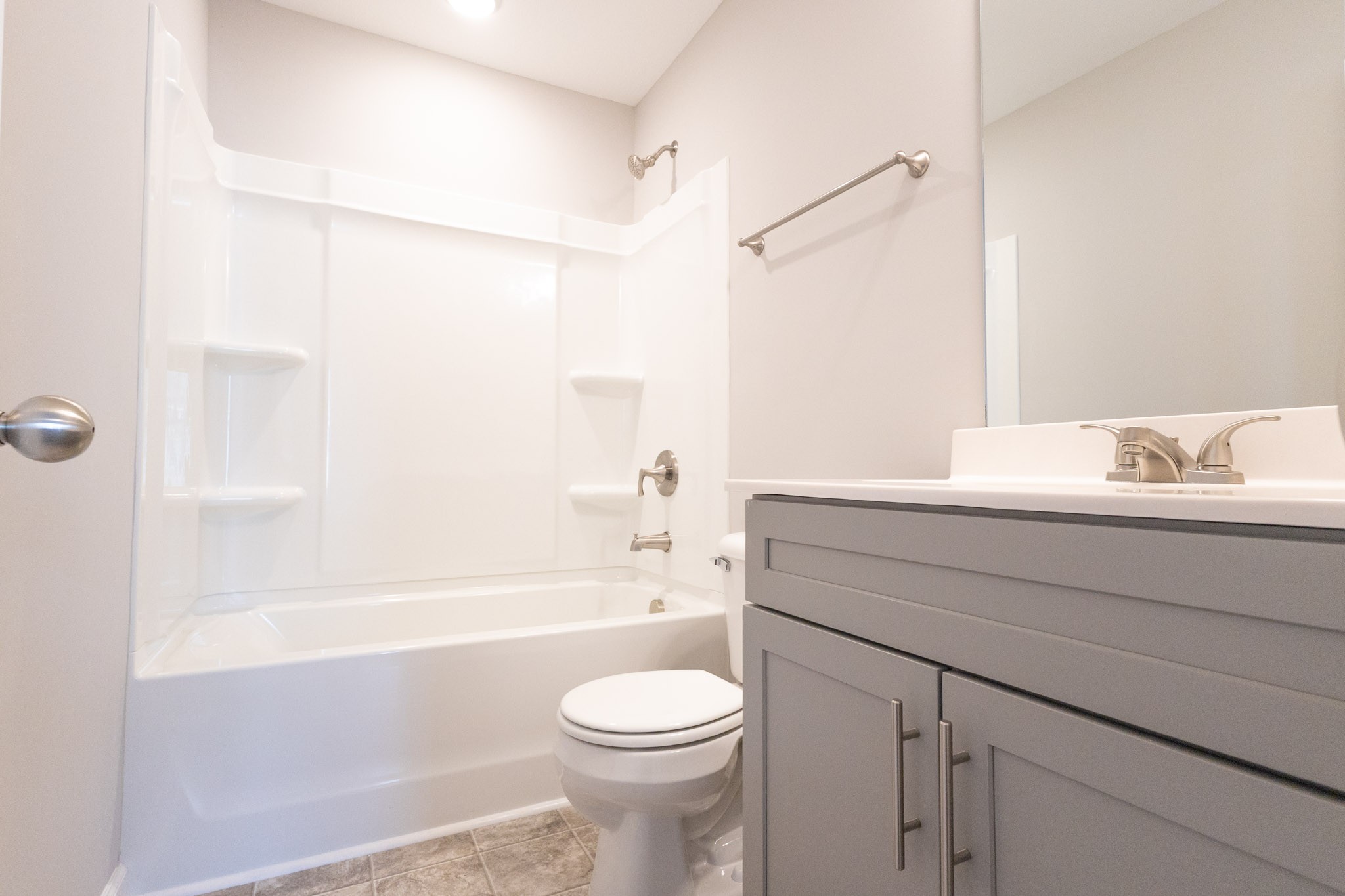 144 Davis Ridge Lane Clarksville, TN 37040 - Photo 23 of 26 a bathroom with a sink a toilet and a bathtub