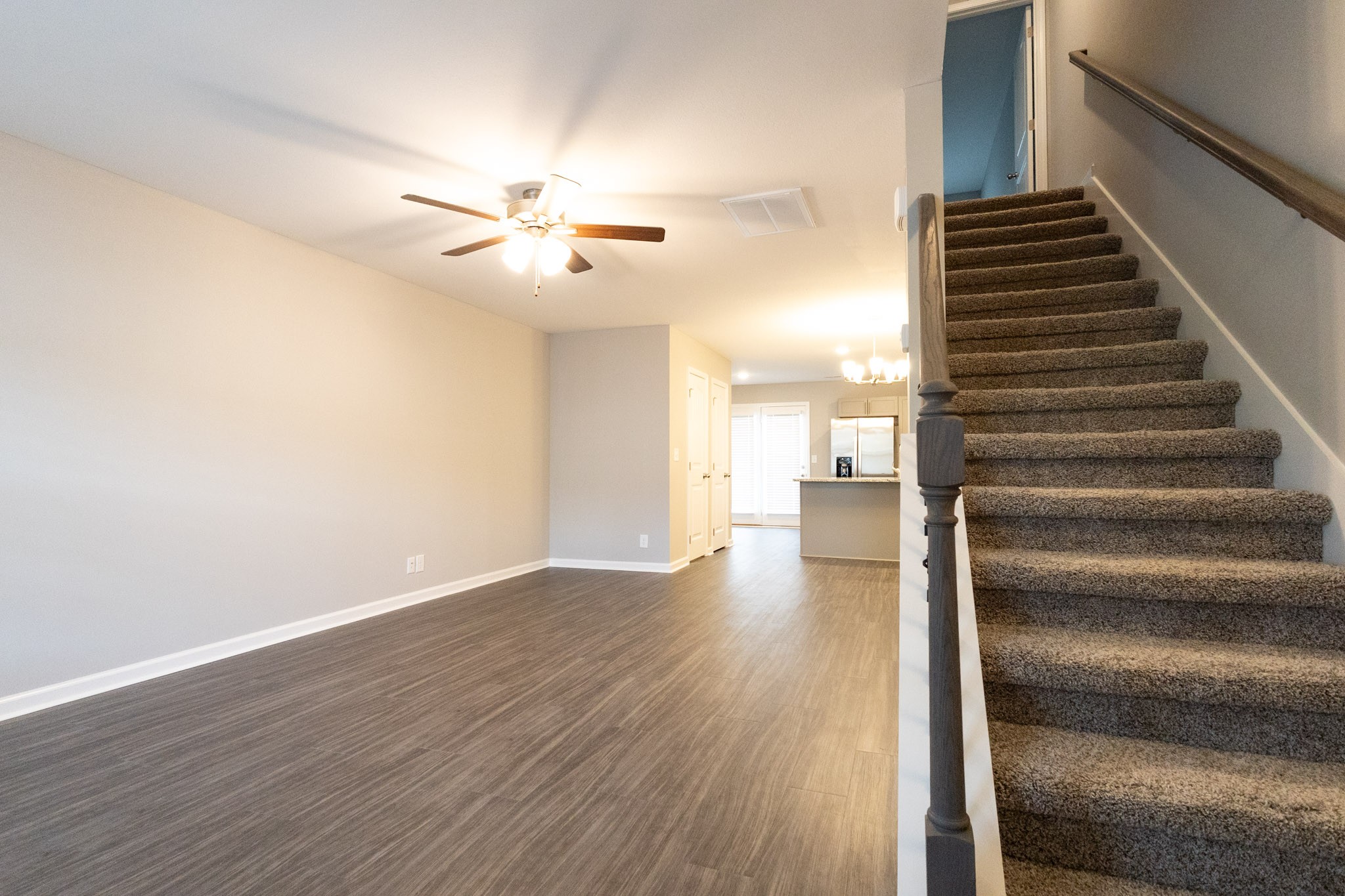 144 Davis Ridge Lane Clarksville, TN 37040 - Photo 4 of 26 a view of an empty room with wooden floor