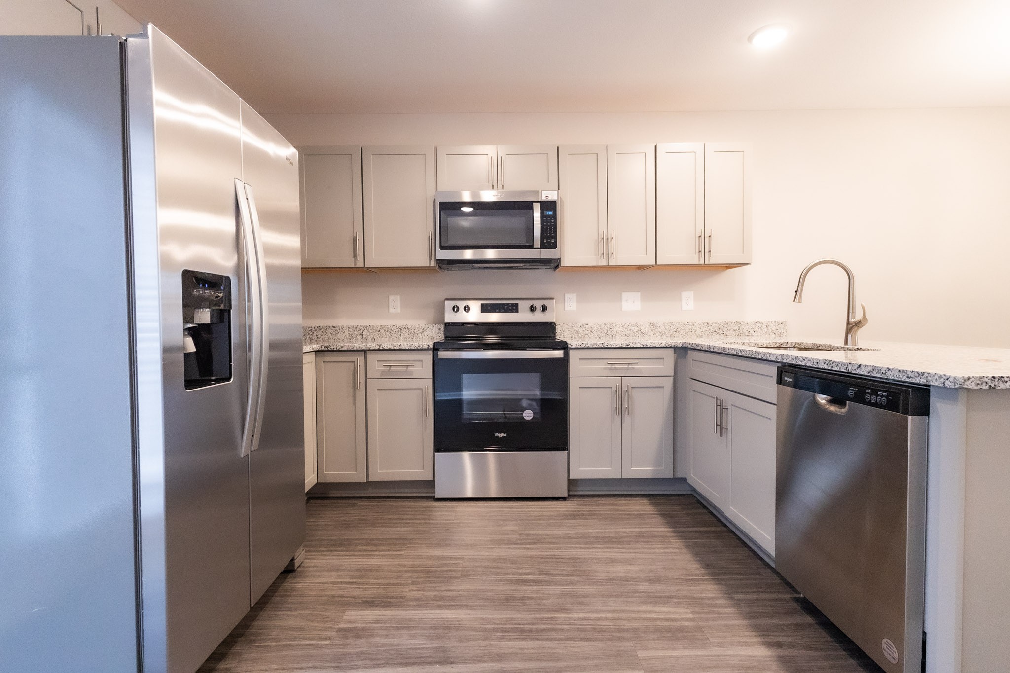 144 Davis Ridge Lane Clarksville, TN 37040 - Photo 7 of 26 a kitchen with a sink stove and refrigerator