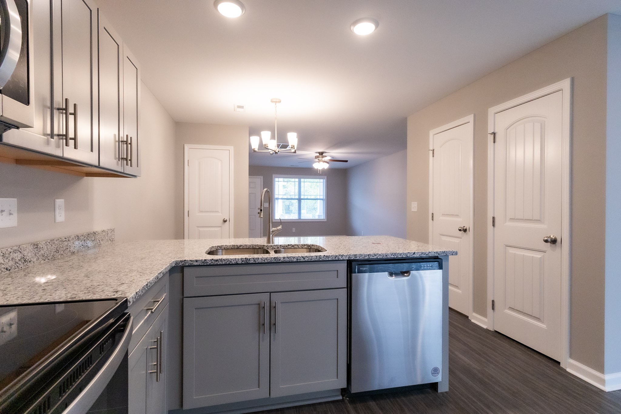 144 Davis Ridge Lane Clarksville, TN 37040 - Photo 8 of 26 a kitchen with granite countertop a sink and cabinets