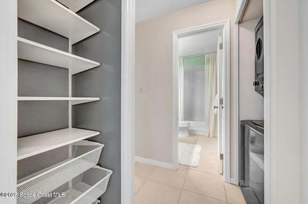 a view of cabinet and utility room