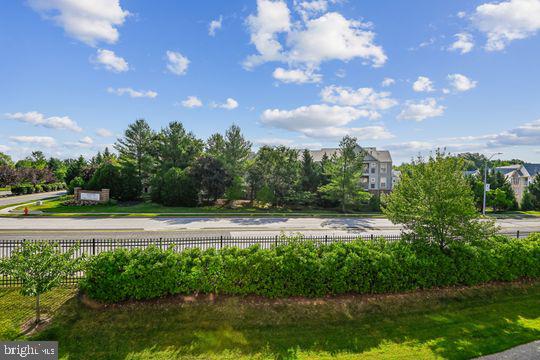 9511 Kingscroft Terrace, Unit 9511F Perry Hall, MD 21128 - Photo 6 of 38 a view of yard with green space