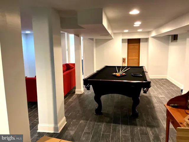 a house view with a sink and wooden floor
