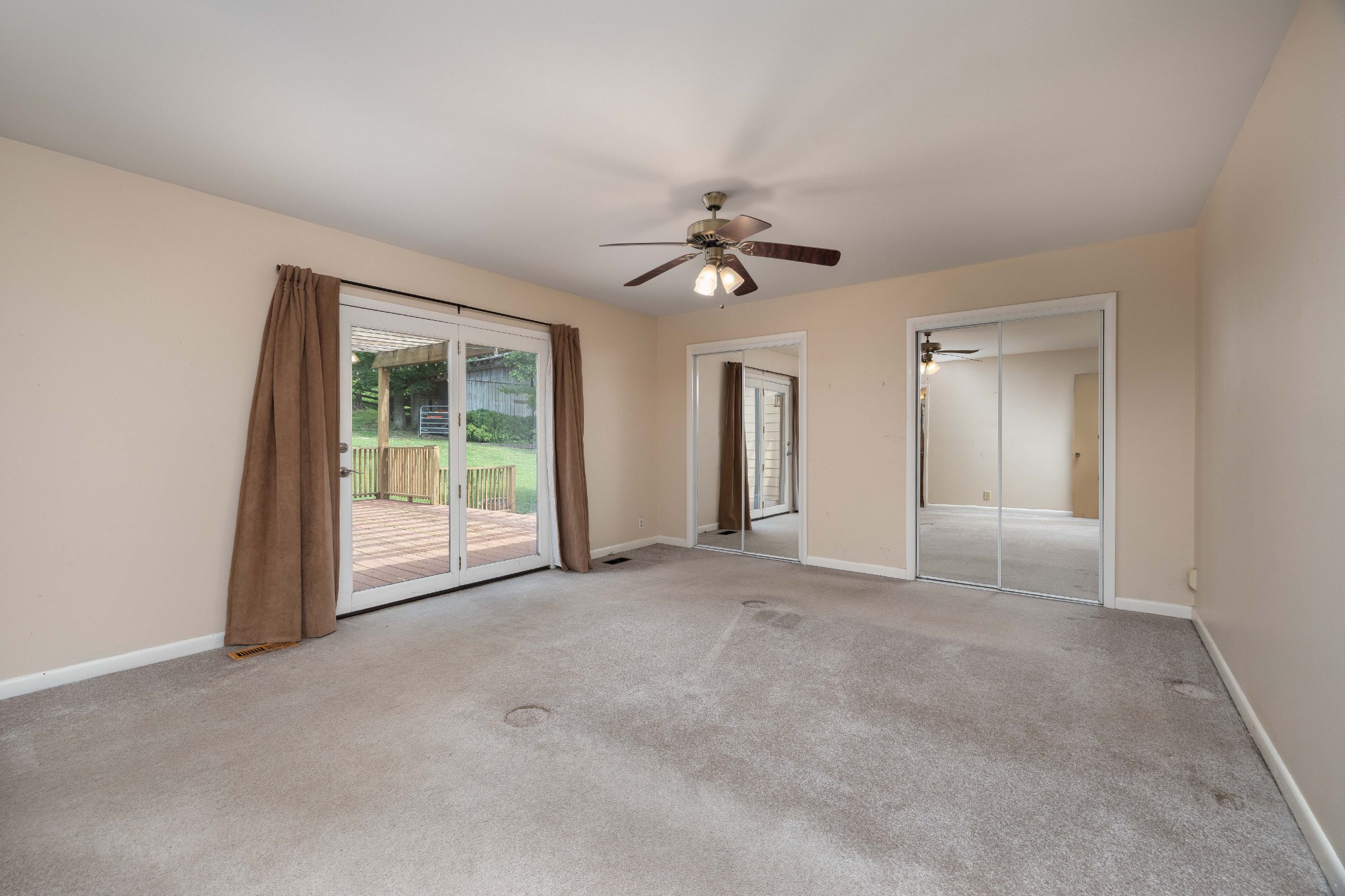 778 High Point Ridge Road Franklin, TN 37069 - Photo 22 of 50 a view of a big room with chandelier fan and windows