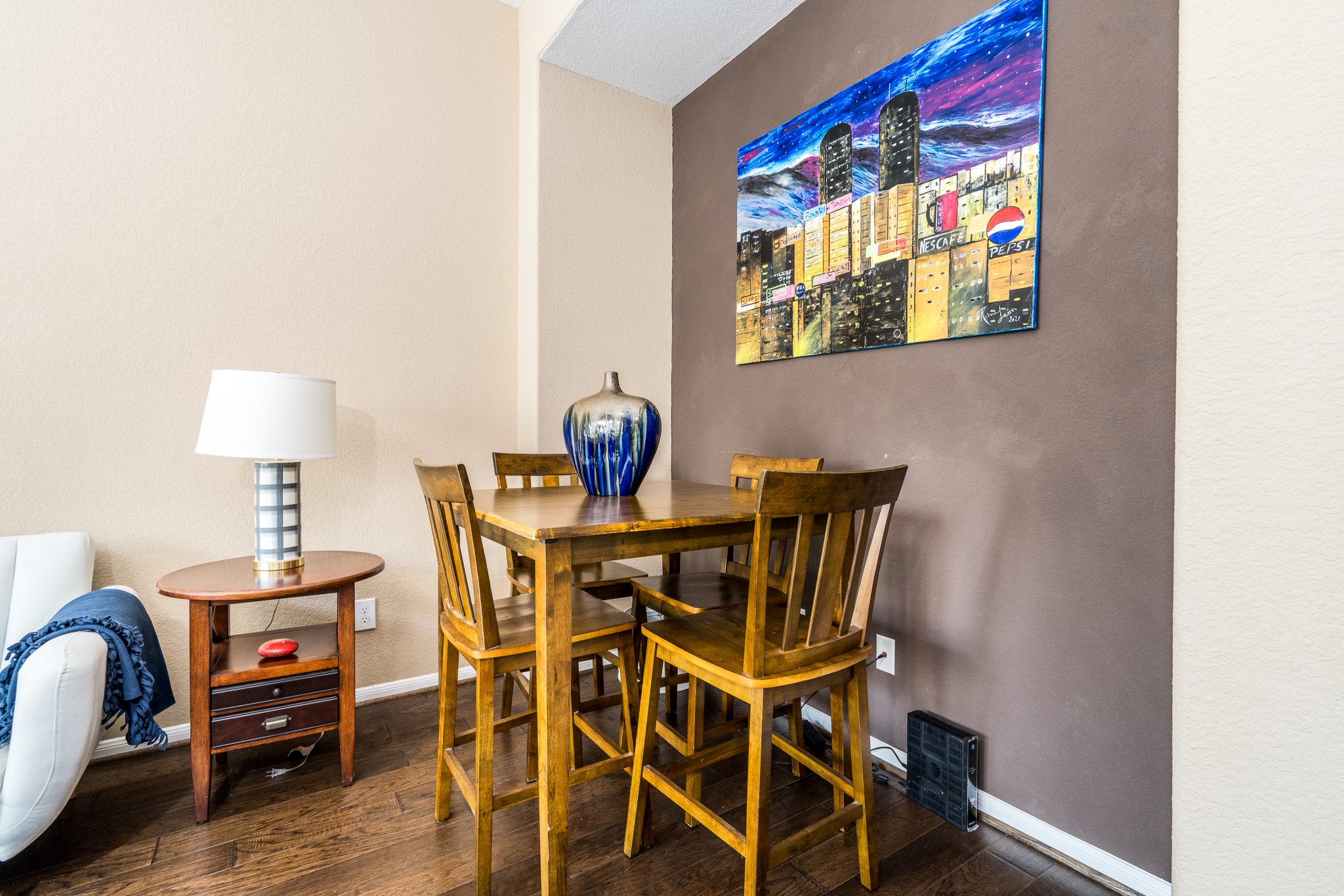 9115 Monarch Mist Lane Houston, TX 77070 - Photo 7 of 26 a dining room with furniture and wooden floor