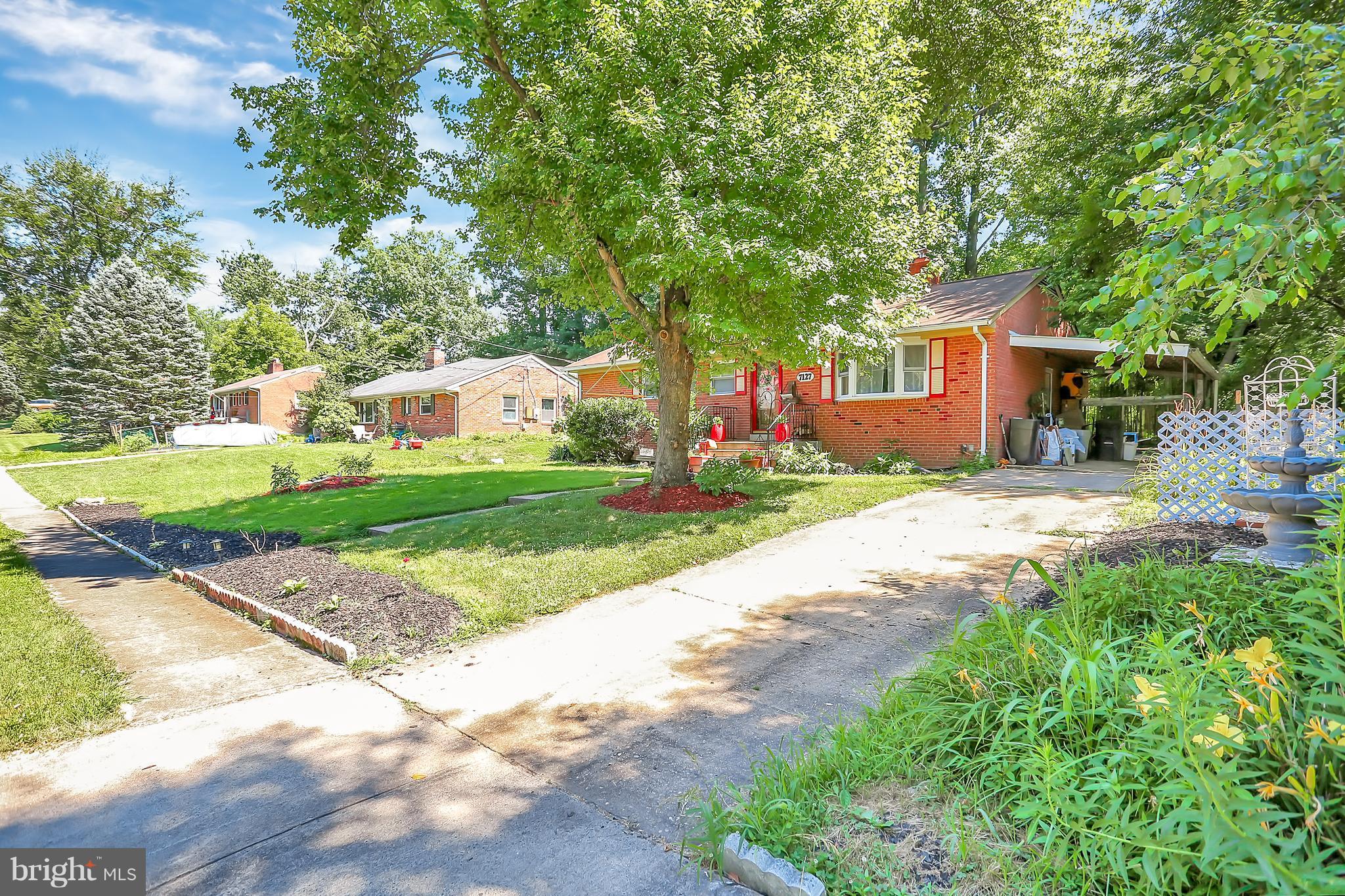 7127 Dalhouse Street Springfield, VA 22151 - Photo 27 of 30 Exterior w/Carport that includes Ceiling Fan