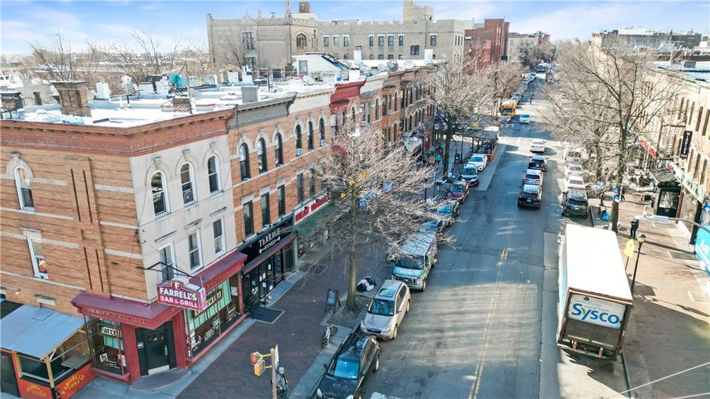43 Reeve Place Brooklyn, NY 11218 - Photo 3 of 18 a city view with tall buildings