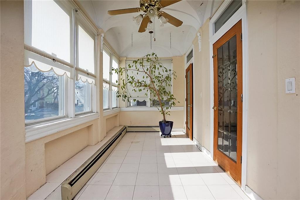 43 Reeve Place Brooklyn, NY 11218 - Photo 4 of 18 a bathroom with a large tub and shower