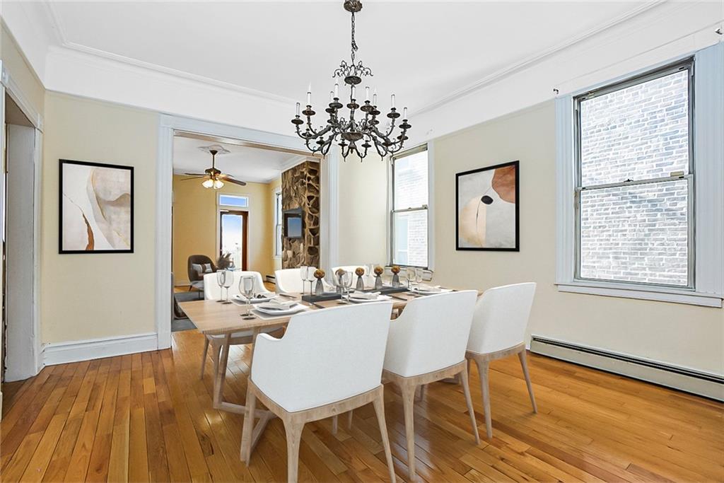 43 Reeve Place Brooklyn, NY 11218 - Photo 9 of 18 a view of a dining room with furniture window and wooden floor