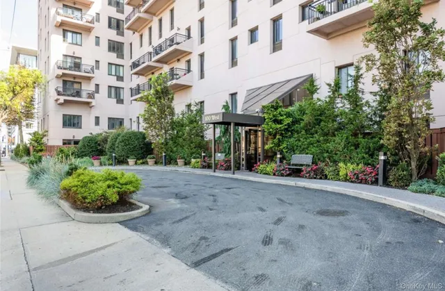 a view of a building with a garden