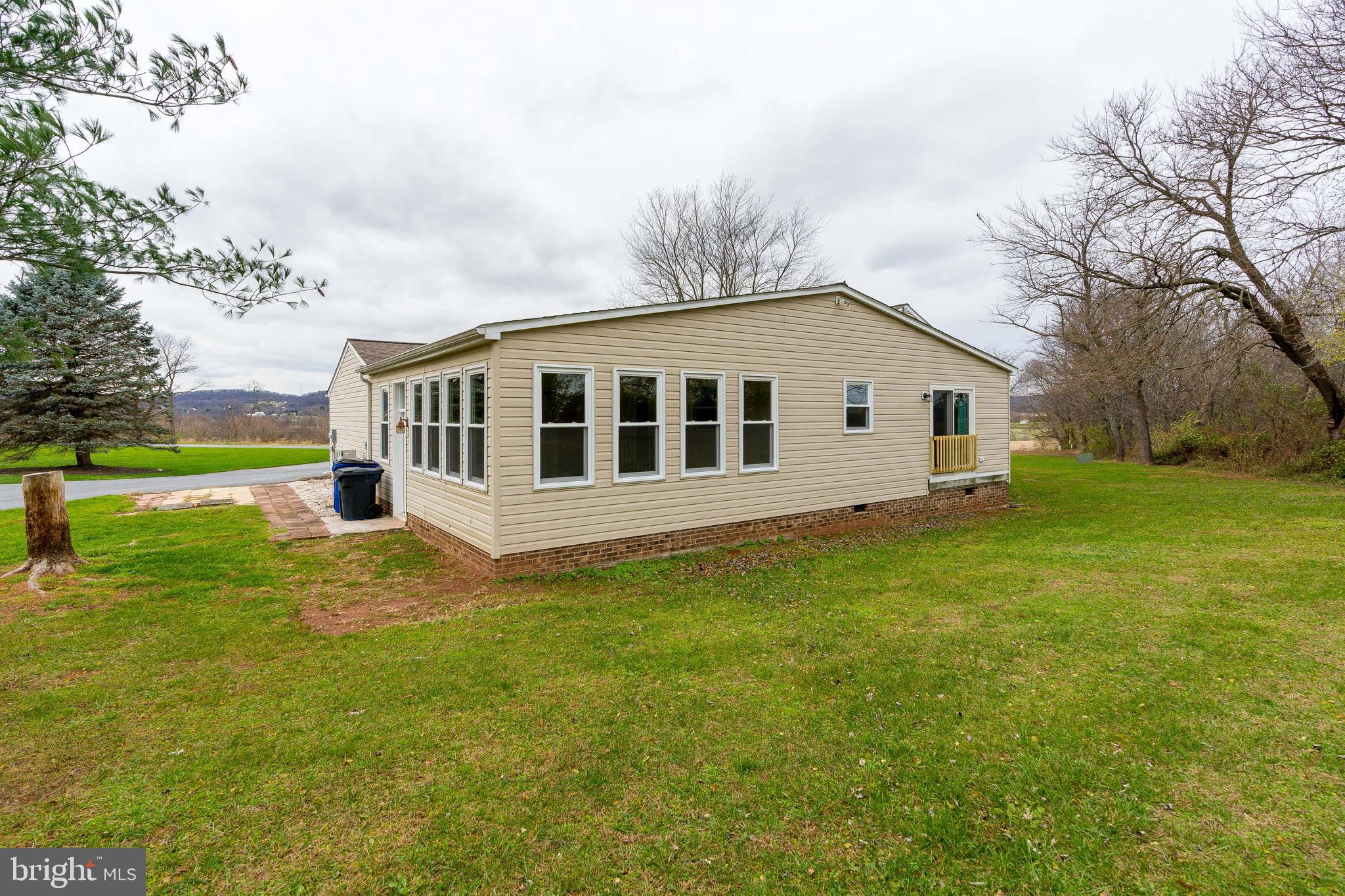 4851 Cap Stine Road Frederick, MD 21703 - Photo 35 of 38 Rear view of sunroom