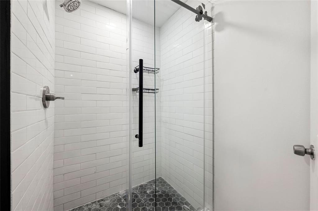653 Somerset Terrace Northeast, Unit 3 Atlanta, GA 30306 - Photo 11 of 16 a bathroom with a shower