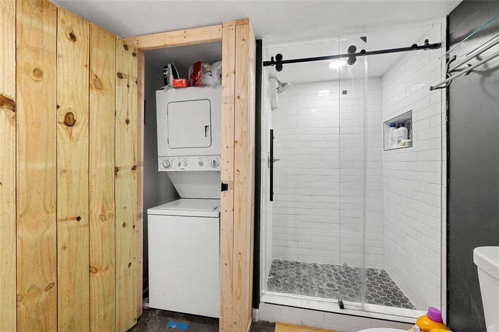 653 Somerset Terrace Northeast, Unit 3 Atlanta, GA 30306 - Photo 16 of 16 a bathroom with a shower and a sink