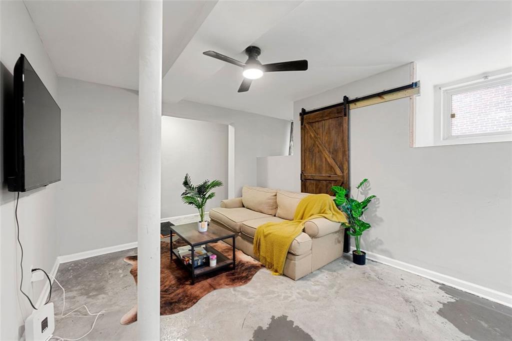 653 Somerset Terrace Northeast, Unit 3 Atlanta, GA 30306 - Photo 5 of 16 a living room with furniture