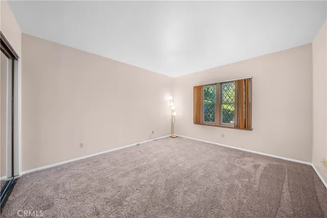 a bathroom with a sink a vanity and a bathtub