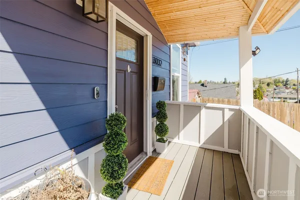 a view of balcony with a potted plant