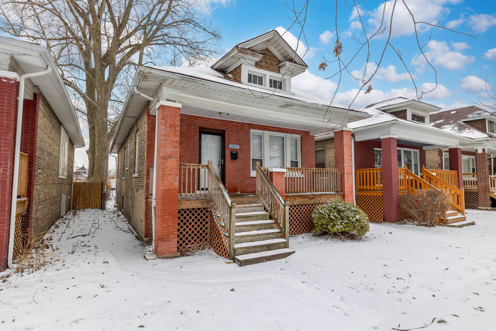 7427 South Perry Avenue Chicago, IL 60621 - Photo 19 of 19 a view of a chair and tables in the patio