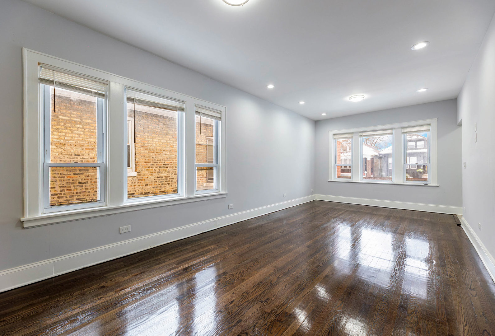 7427 South Perry Avenue Chicago, IL 60621 - Photo 4 of 19 a view of an empty room and window