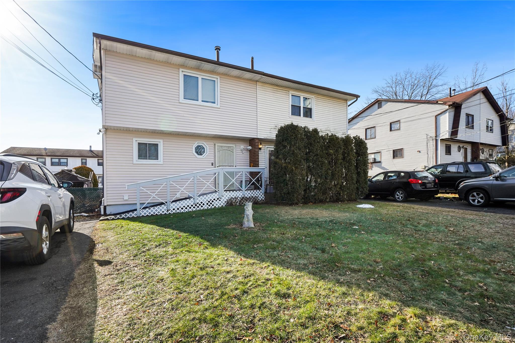 82 Division Avenue Spring Valley, NY 10977 - Photo 1 of 1 a view of a house with a back yard