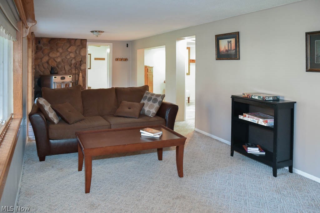 4869 Mayfair Road North Canton, OH 44720 - Photo 8 of 25 Family room on the lower level with a wood burner.
