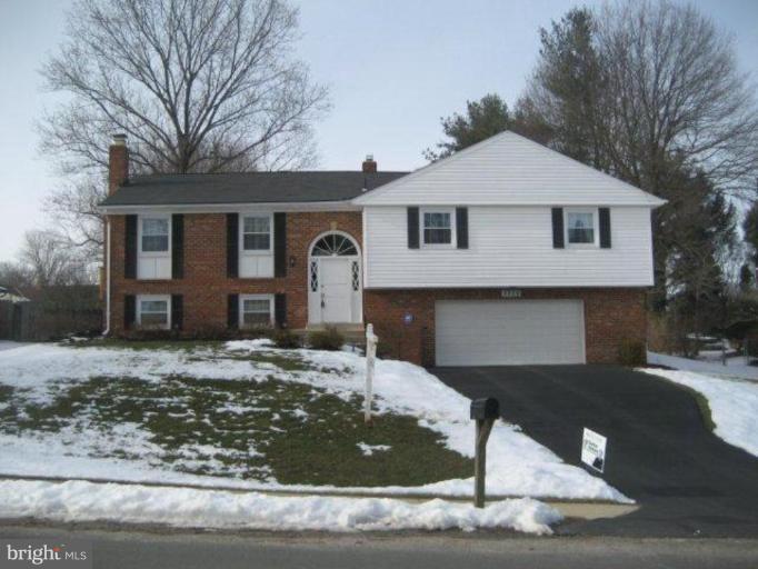 3725 Briars Road Olney, MD 20832 - Photo 1 of 12 a front view of a house with garden
