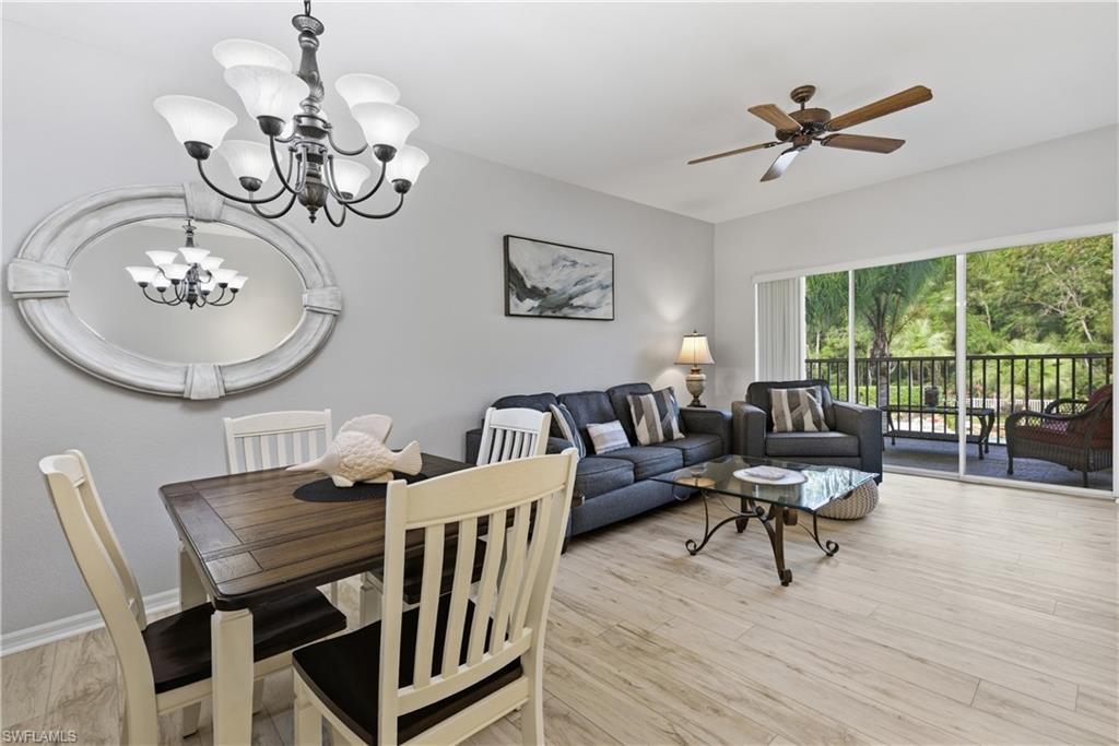 9175 Celeste Drive, Unit 204 Naples, FL 34113 - Photo 16 of 50 Dining room into family room