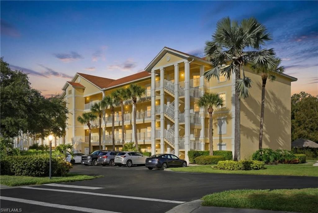 9175 Celeste Drive, Unit 204 Naples, FL 34113 - Photo 2 of 50 Twilight in Coral Falls Resort