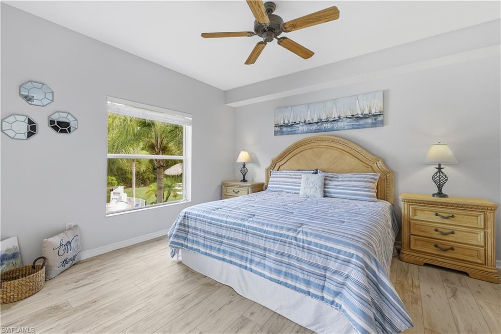 9175 Celeste Drive, Unit 204 Naples, FL 34113 - Photo 21 of 50 Primary bedroom with a view!