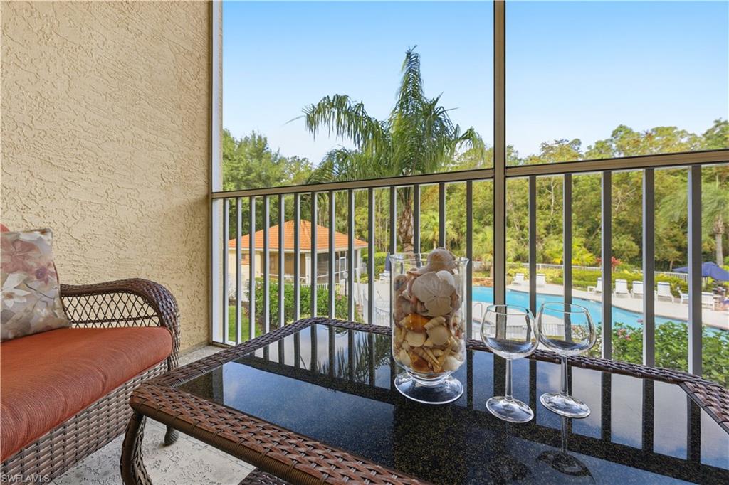 9175 Celeste Drive, Unit 204 Naples, FL 34113 - Photo 30 of 50 Cozy settee ready for a wine tasting ...