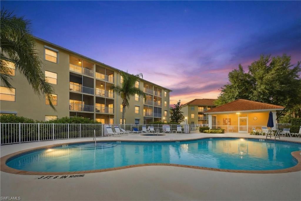 9175 Celeste Drive, Unit 204 Naples, FL 34113 - Photo 33 of 50 Romantic nights poolside as the sun sets