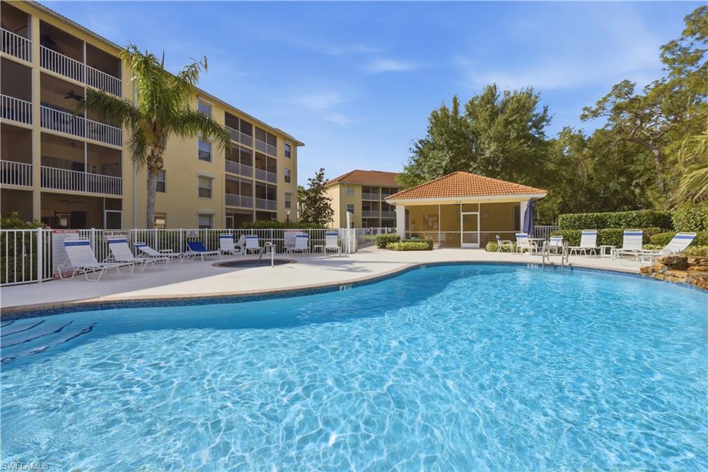 9175 Celeste Drive, Unit 204 Naples, FL 34113 - Photo 34 of 50 Refreshing waters cool your day in the sun