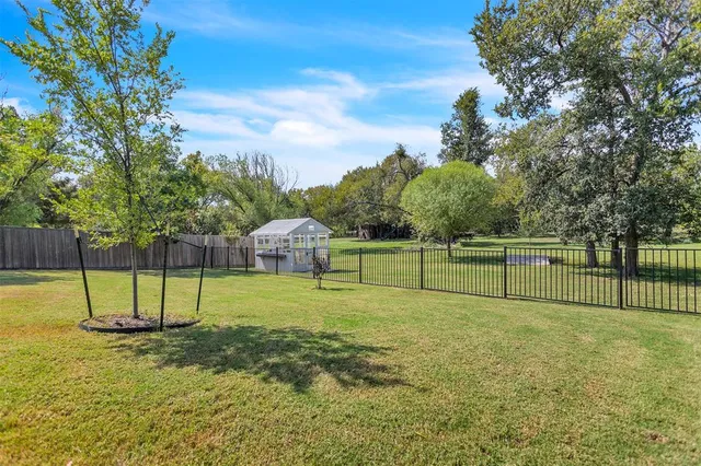a view of a bench in a park