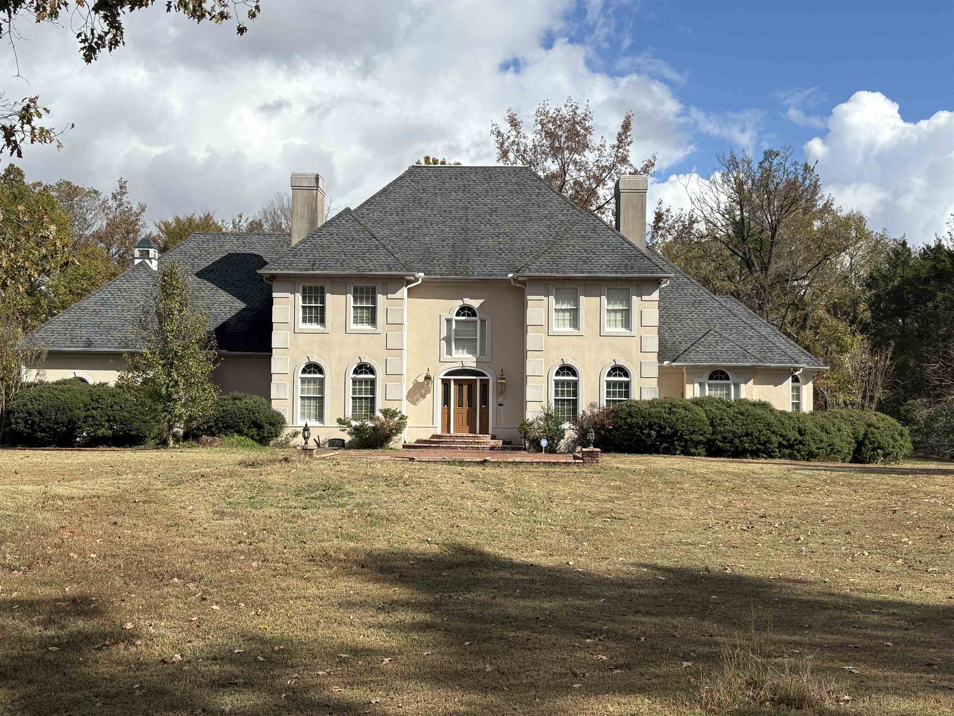 1200 Sand Ridge Bargerton Road Lexington, TN 38351 - Photo 2 of 40 a front view of a house with a yard