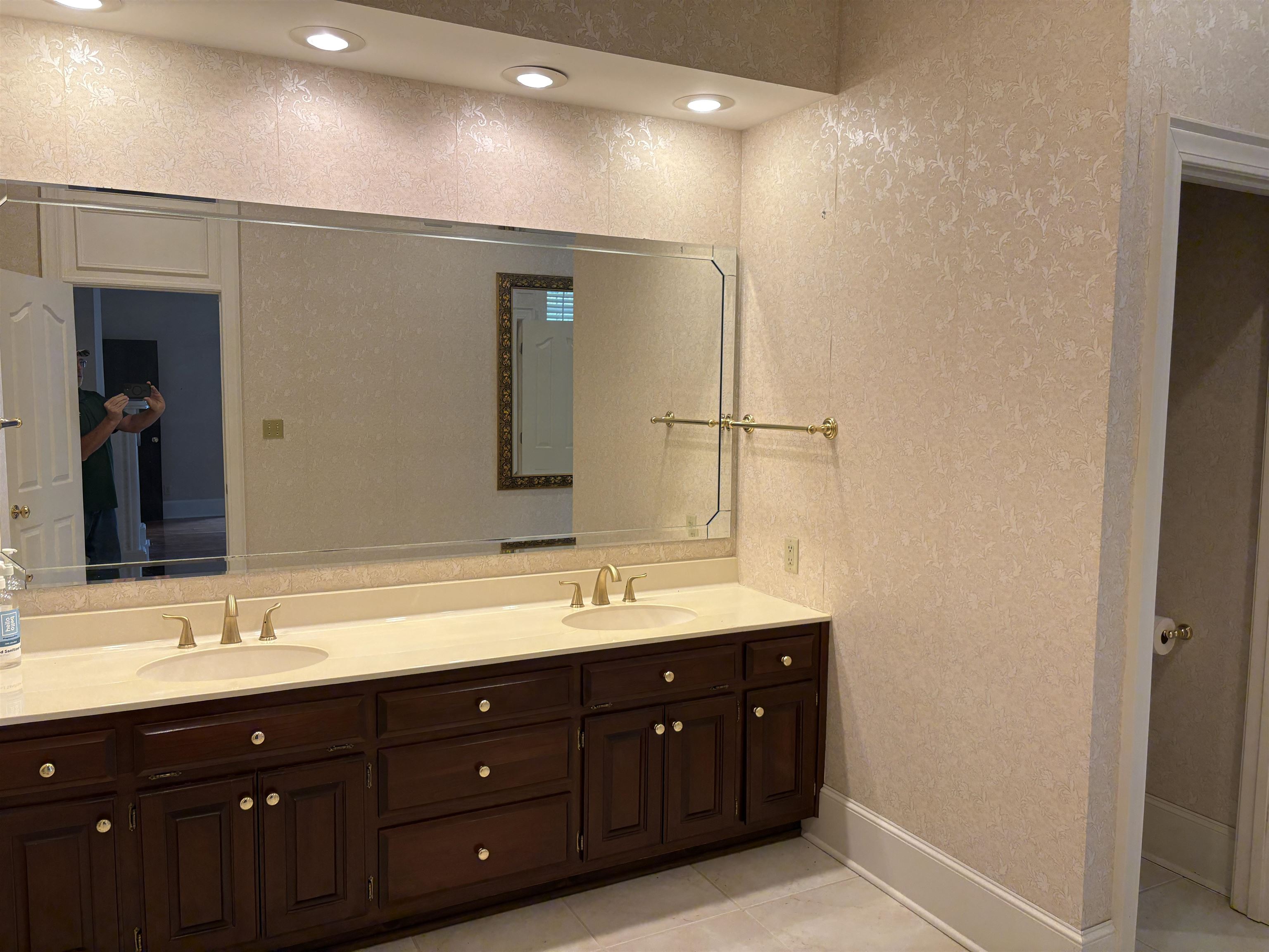 1200 Sand Ridge Bargerton Road Lexington, TN 38351 - Photo 29 of 40 a bathroom with a double vanity sink and a mirror