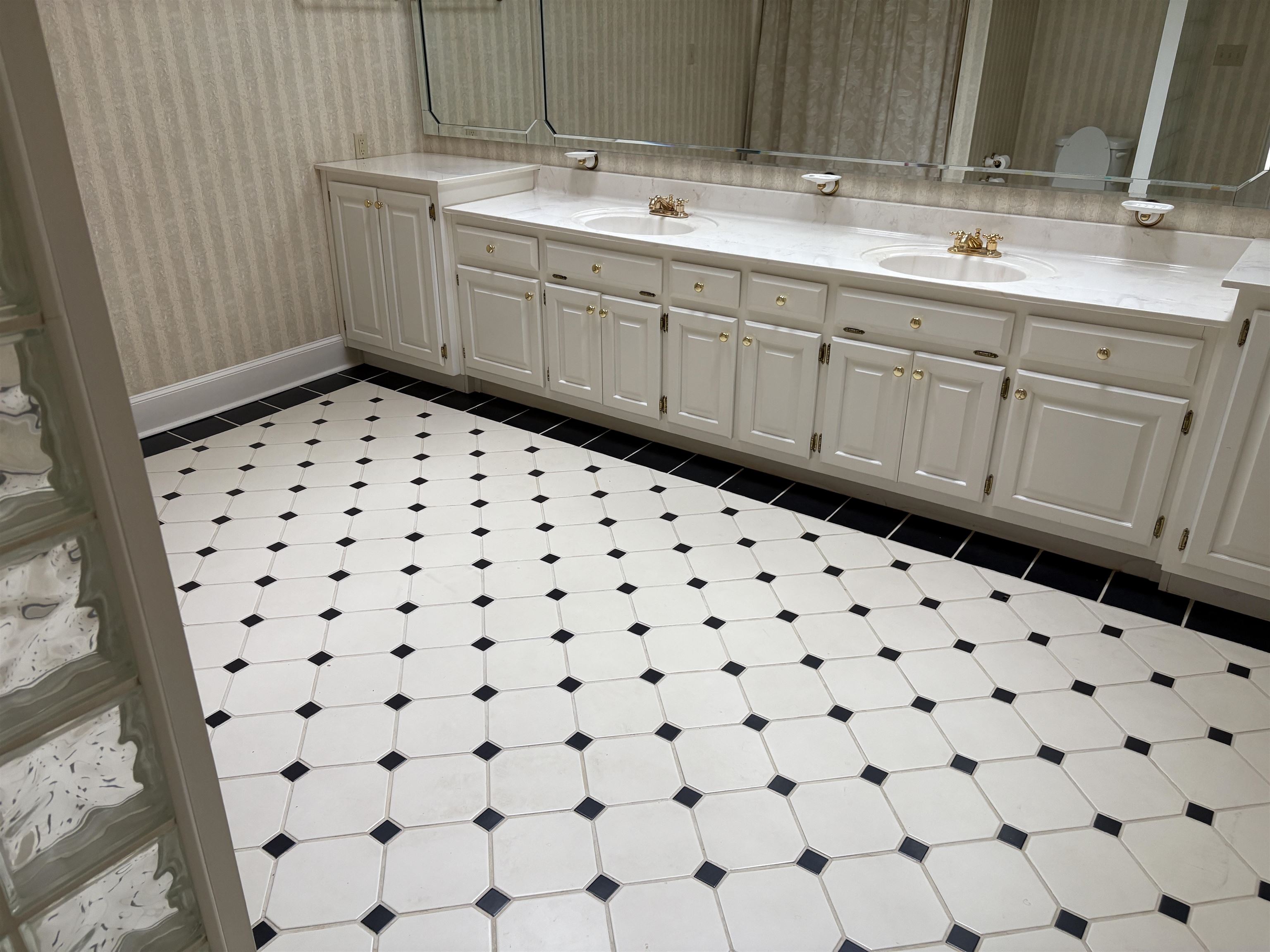 1200 Sand Ridge Bargerton Road Lexington, TN 38351 - Photo 35 of 40 a bathroom with a sink a vanity and a mirror