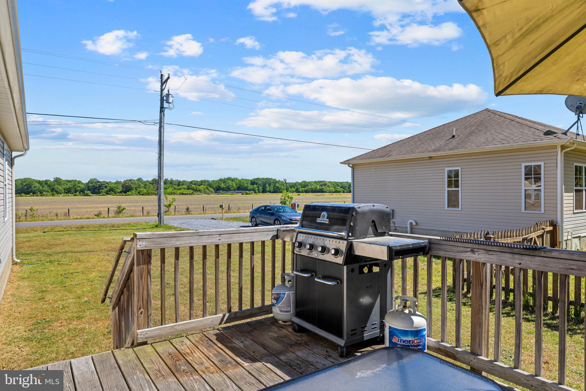 1523 Bowie Road Colonial Beach, VA 22443 - Photo 22 of 34 Scenic deck with grill and open fields.