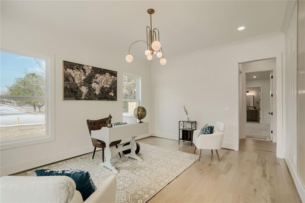 932 Cooper Road Loganville, GA 30052 - Photo 15 of 36 a living room with furniture and a window
