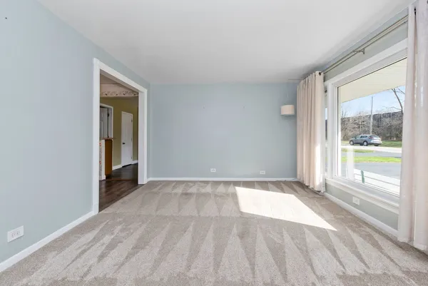 a view of an empty room and window